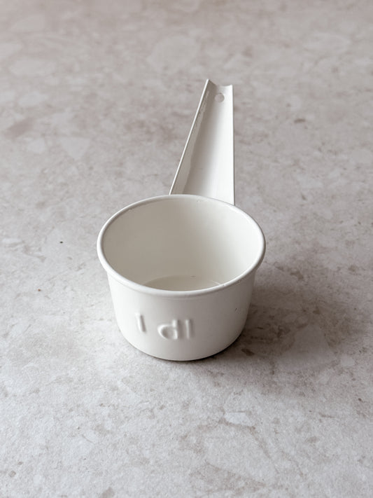 Ralf Decilitermått, Vit Metall